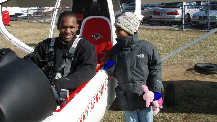 Cadet Keith Taylor with his little brother after his discovery flight in 2014.